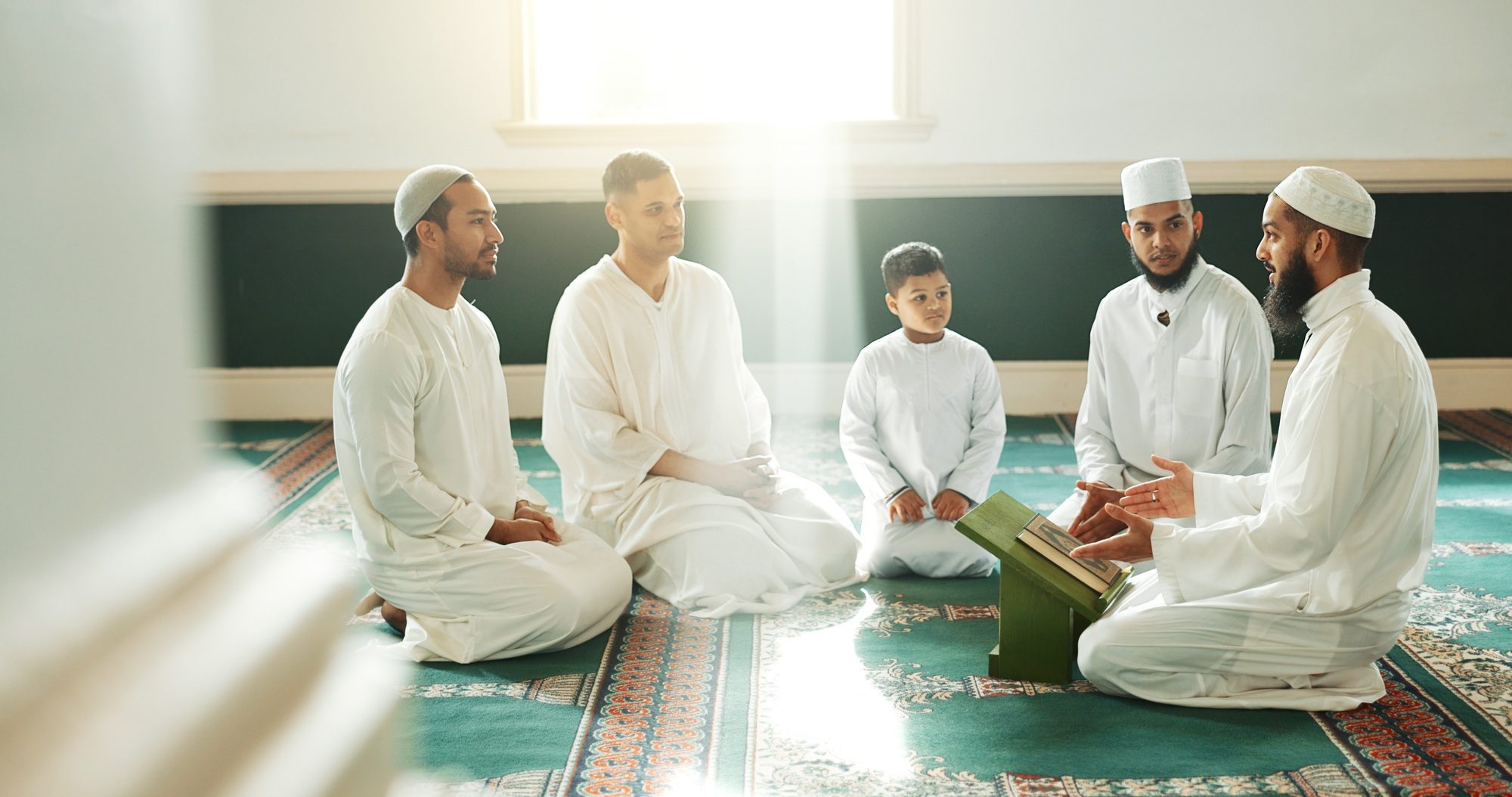 Muslim, religion and people in mosque for praying, religious education and worship or prayer. Islam