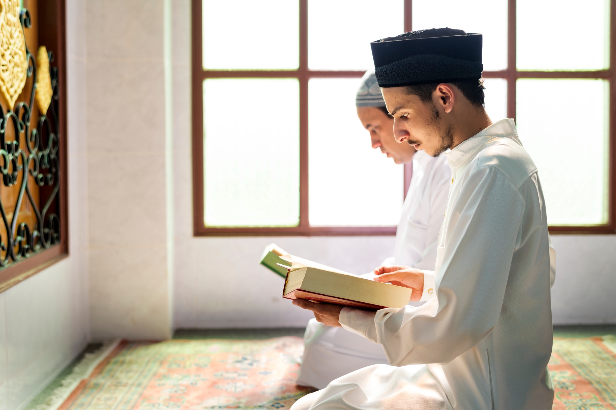 Muslims reading from the quran