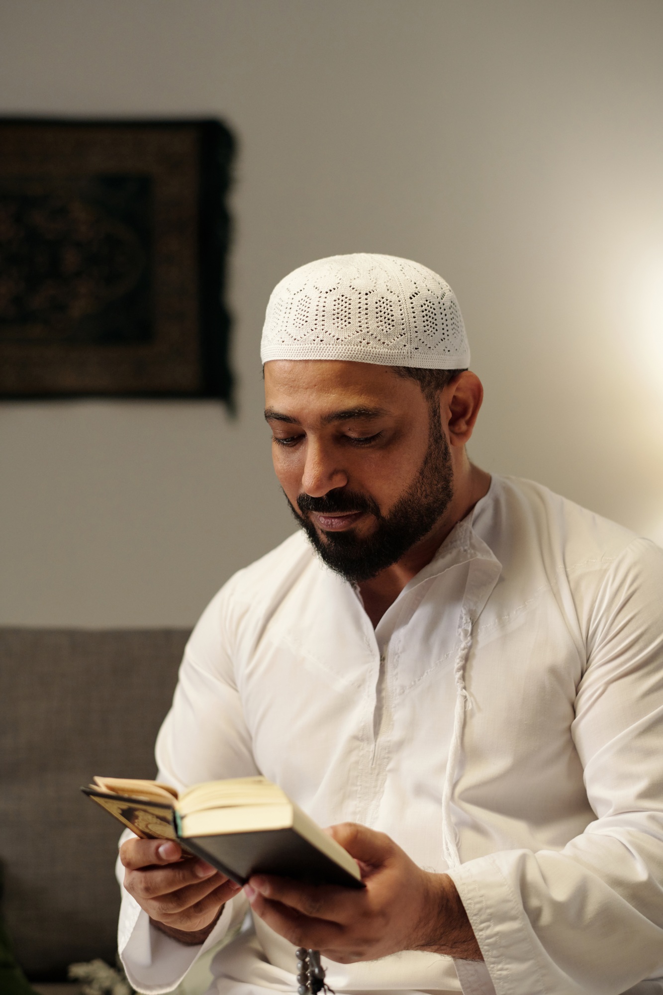 Modern Muslim Man Reading Quran