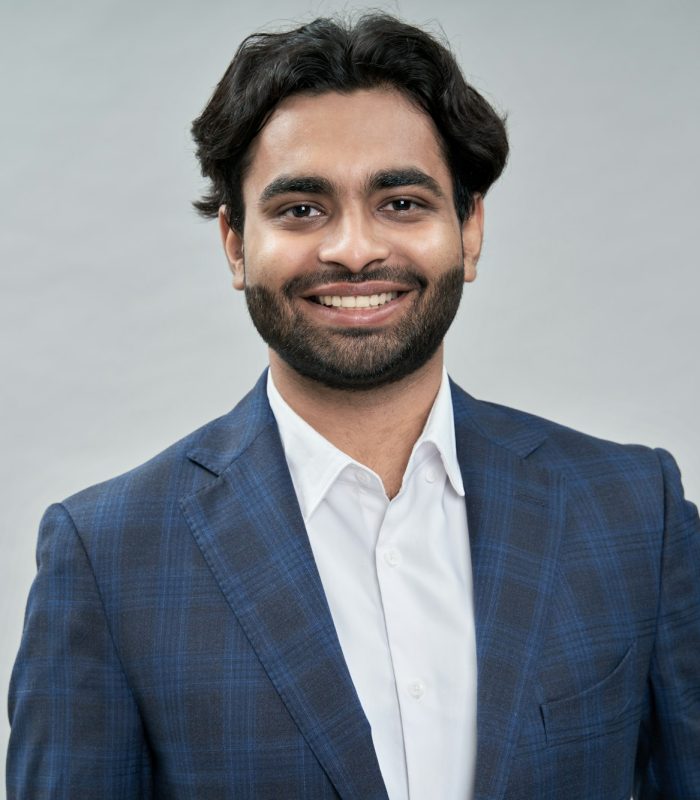 happy-young-indian-arab-business-man-wearing-suit-headshot-portrait