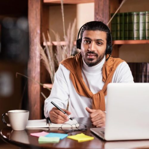 modern-arab-teacher-man-recording-virtual-video-lecture-sitting-indoors-1024x627