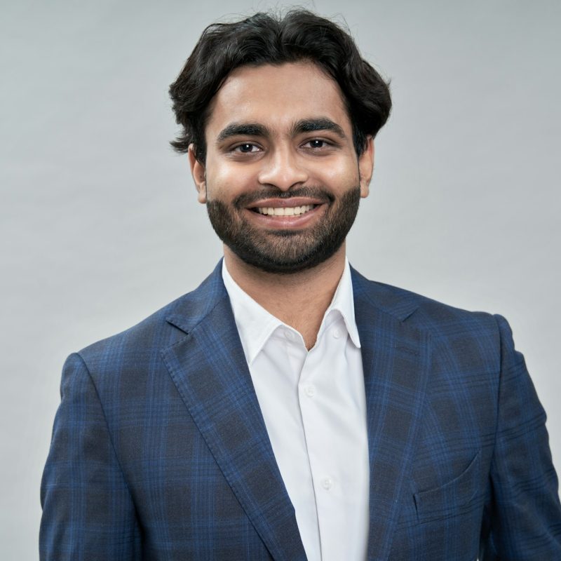 happy-young-indian-arab-business-man-wearing-suit-headshot-portrait