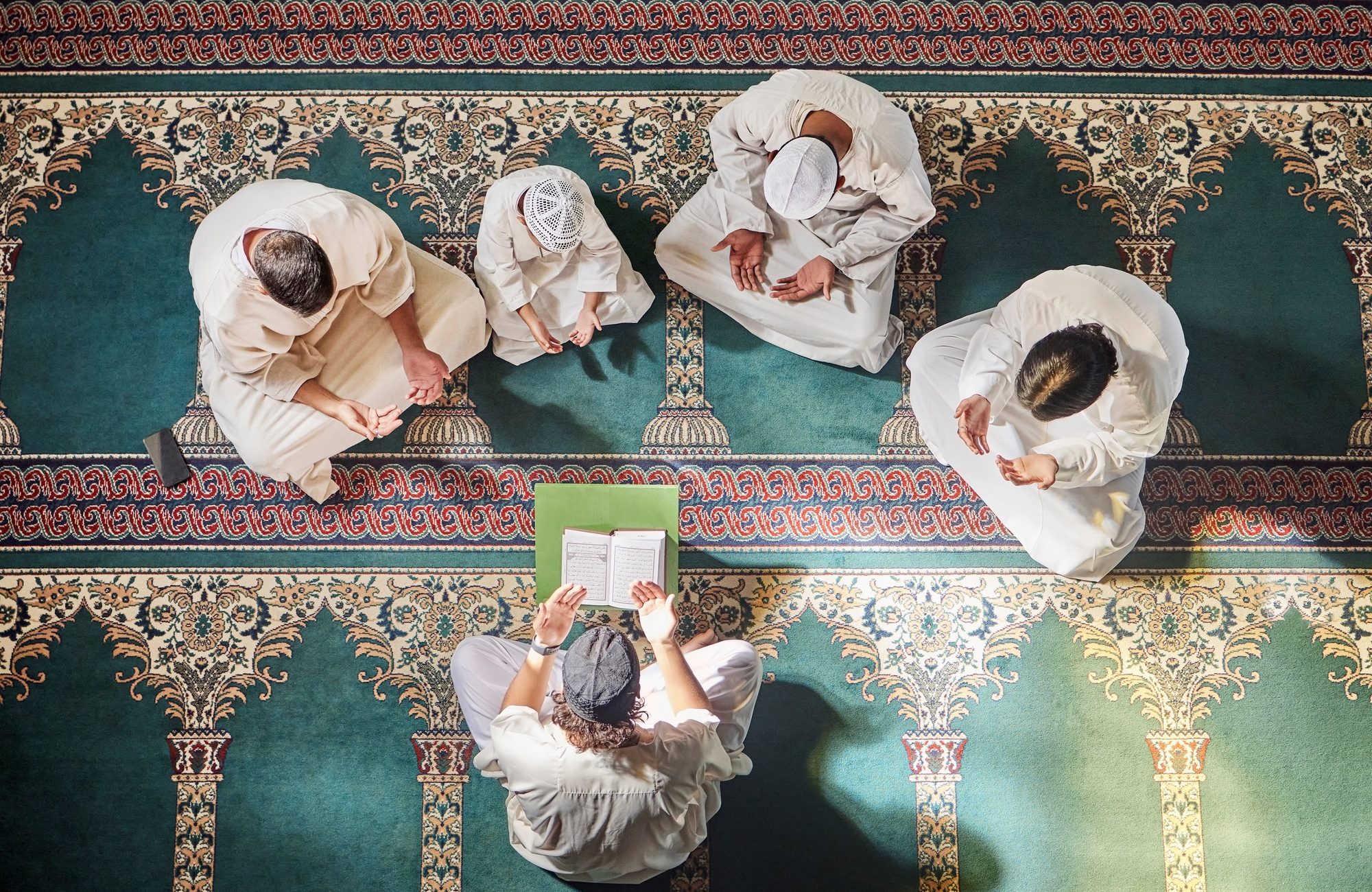 Above mosque carpet, group and quran for faith, religion and prayer for gratitude, peace or mindful