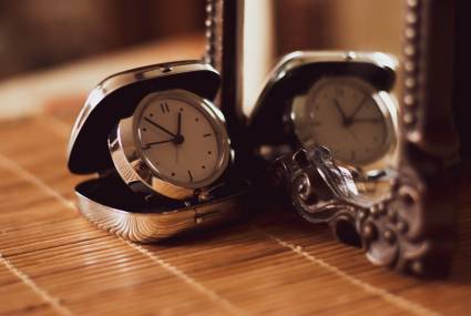 pocket-folding-watch-in-the-mirror-time-concept-2025-01-08-20-42-49-utc