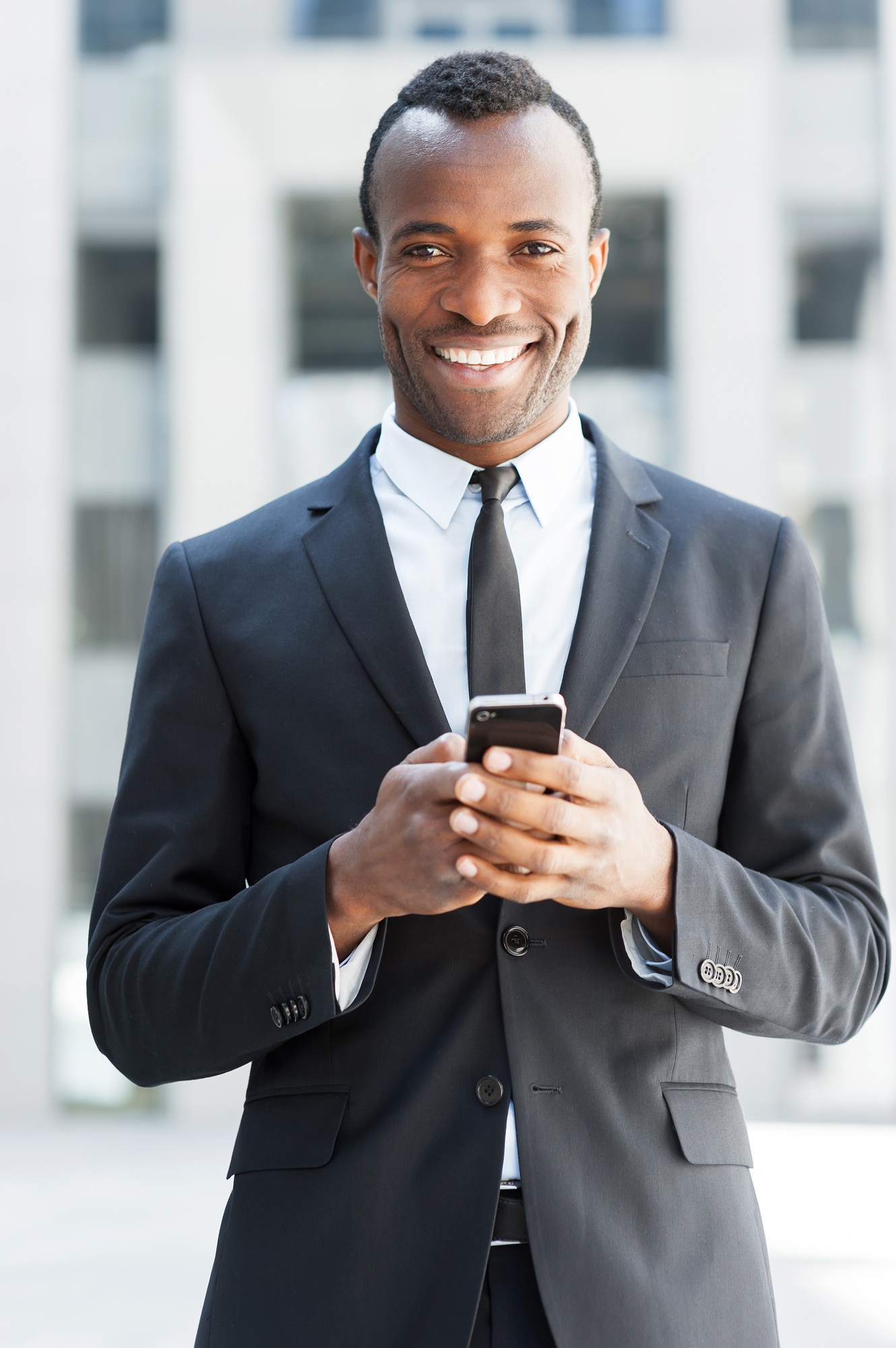 Businessman with mobile phone.